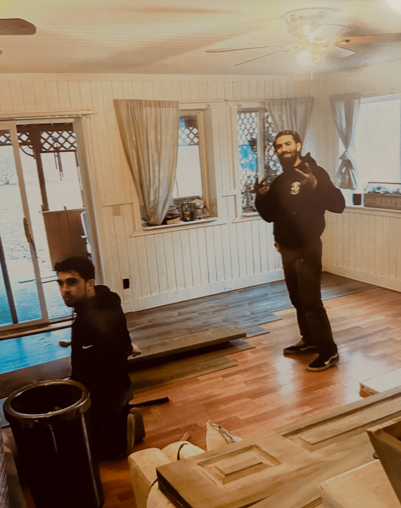 Interior remodeling project before laminate floor installation and wall and ceiling painting in Davison Michigan